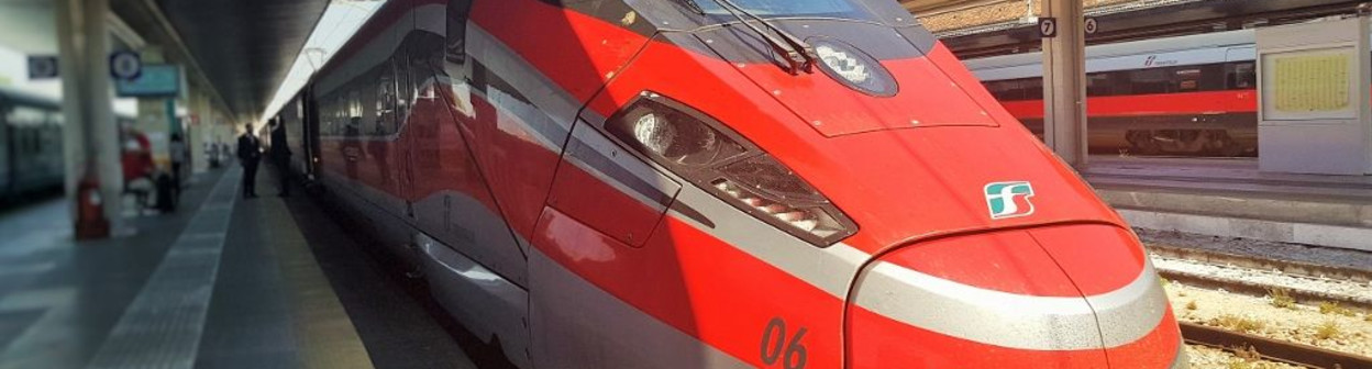 A Frecciarossa 1000 train awaits departure from Napoli Centrale