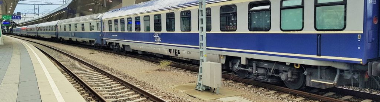 The 'Dacia' train awaits departure from Wien Hbf 