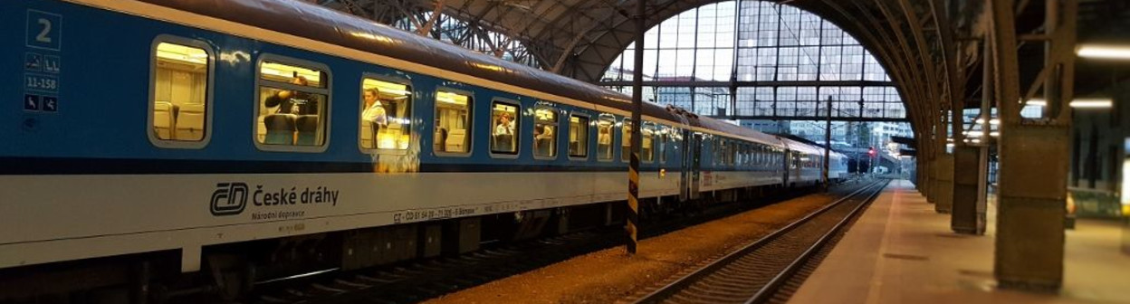 A train on an Ex service has arrived at Praha hl.n station