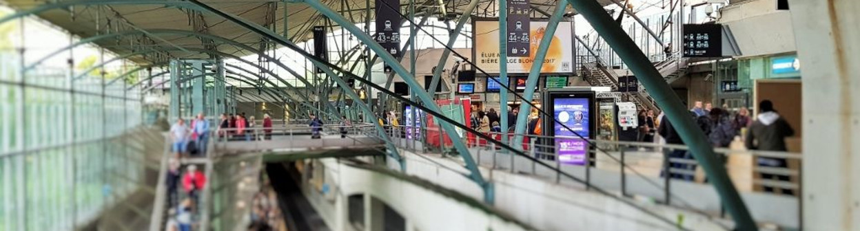 Passengers head down the escalators to take a TGV train - Eurostar passengers take a different route