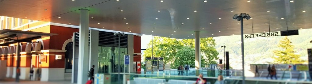 Lugano station - the escalators lead down to the main station hall that has access to the funicular