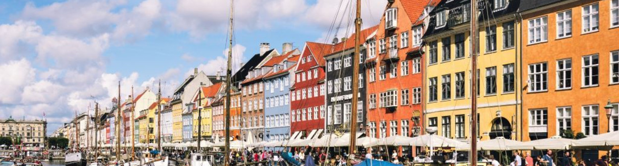 By train from Copenhagen if you stop there while on a cruise