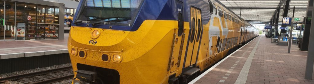 An IC train operated by NS has arrived in Rotterdam