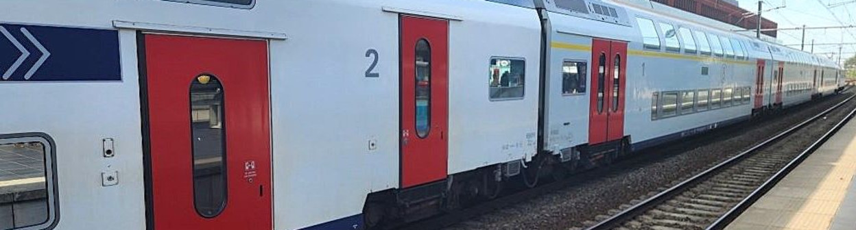 A Belgian IC train in Brugge with double-deck coaches