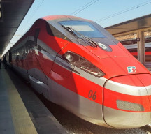 A Frecciarossa 1000 train awaits departure from Napoli Centrale