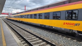 A Regiojet train departs for Prague