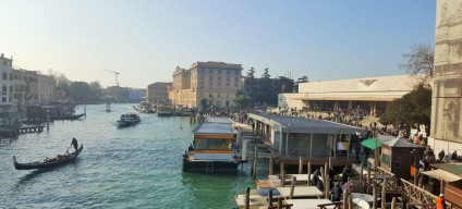 Venezia Santa Lucia station is the flat roofed building to  the right