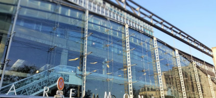 The exterior street view of Paris Montparnasse station - note the escalator heading up to the trains.