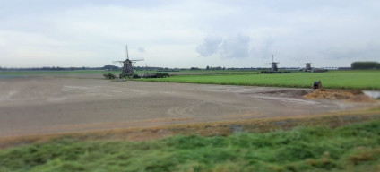 Look out for the windmills between Schiphol and Rotterdam