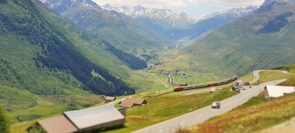 The Glacier Express winds down to Andermatt during its epic journey