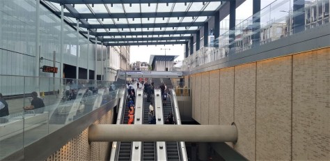 Having taken these elevators up from the Elizabeth line, the main concourse is through the gaps in the wall on the left