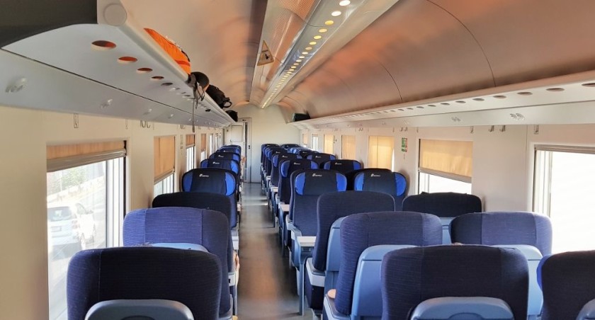 A 1st class seating saloon on a yet to be refurbished Trenitalia InterCity train