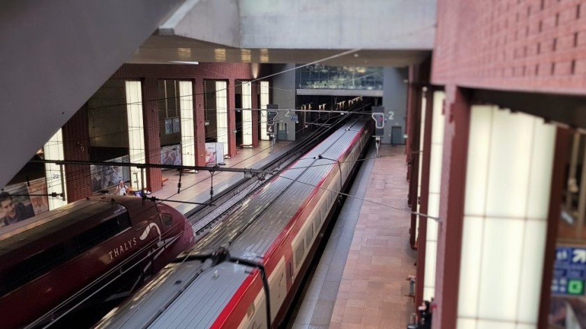 A refurbished Thalys train (on the right) arrives in Antwerpen