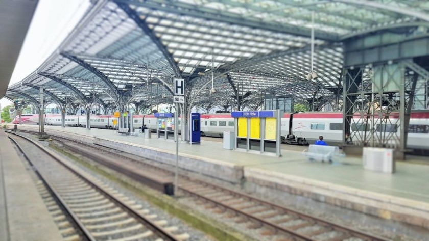 A yet to be refurbished Thalys train (grey doors) arrives in Koln