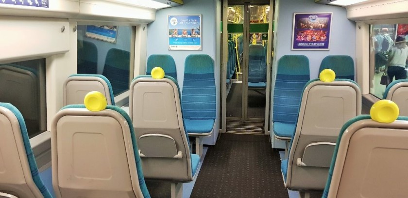 An example of the Standard Class seats arranged 2 + 2 across the aisle