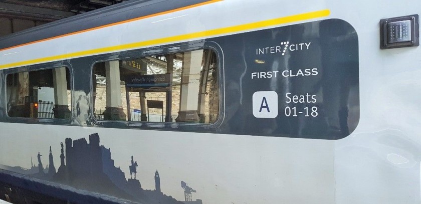 First Class coaches have the yellow band - note that the closest seats to each door are clearly indicated