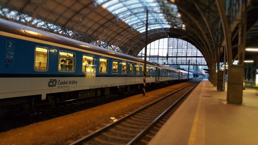 A train on an Ex service has arrived at Praha hl.n station