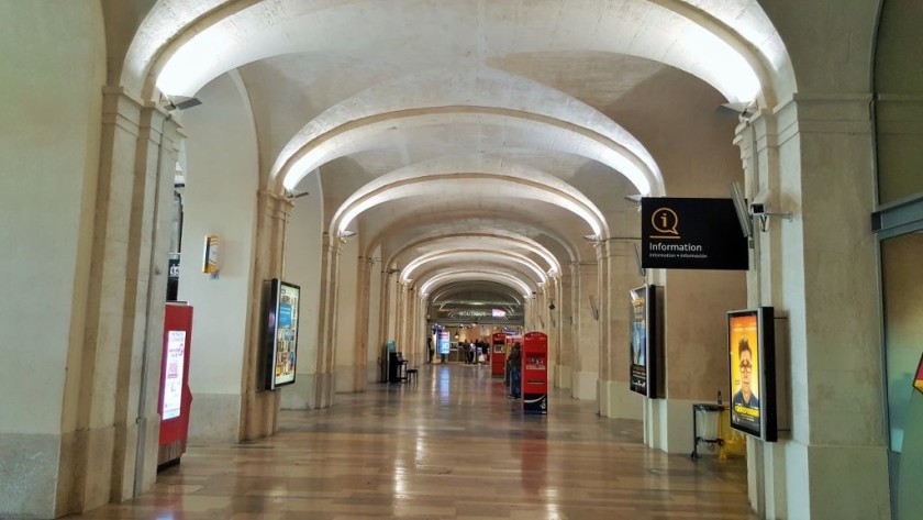 Looking across the spectacular main hall at Nimes station towards the ticket offices
