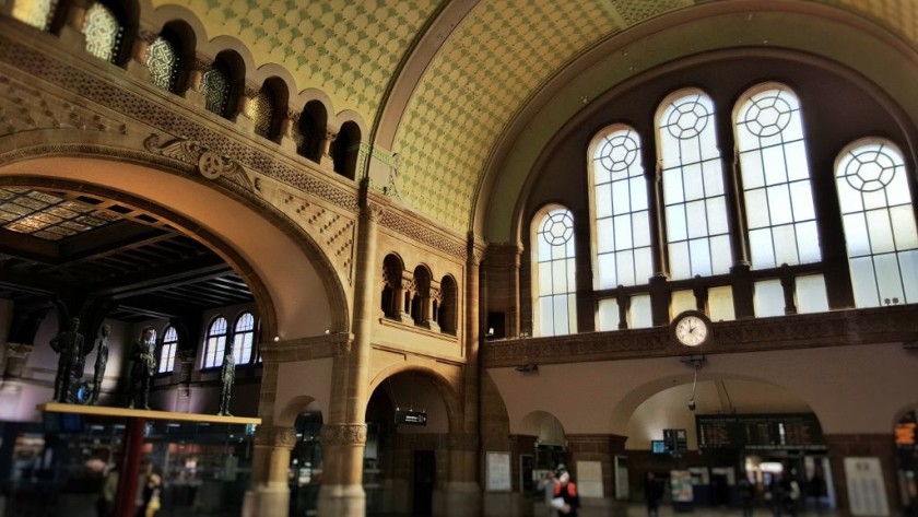 The main departure hall interior, the access to the trains is under the clock