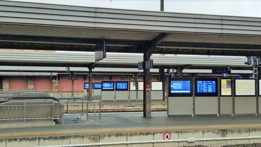 The blue departure screens on each platform, those on the left show the train formation and zone info
