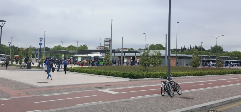 The bus station used by the local services is just outside the main exit
