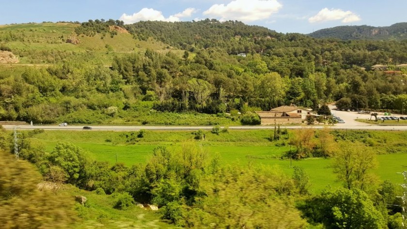 The scenery from the right of the train as it leaves Barcelone behind
