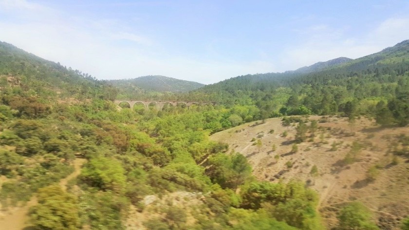 North of Cordoba in particular, the trains rush between tunnels and viaducts,look out for glimpsed of the old line