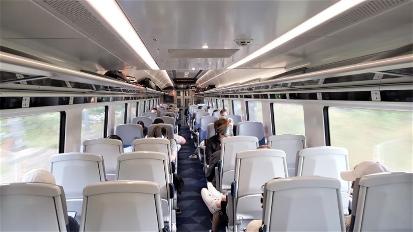 The Standard Class seating saloon has a mix of airline and table seats