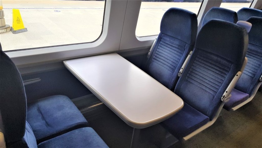 A mix of table and 'airline-style' seats are available