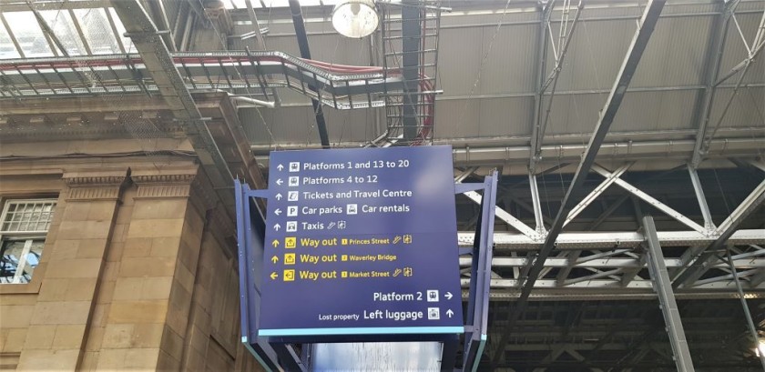 On the signs within the station Princess St is exit 1; Waverley Bridge is 2 and Market St is 3