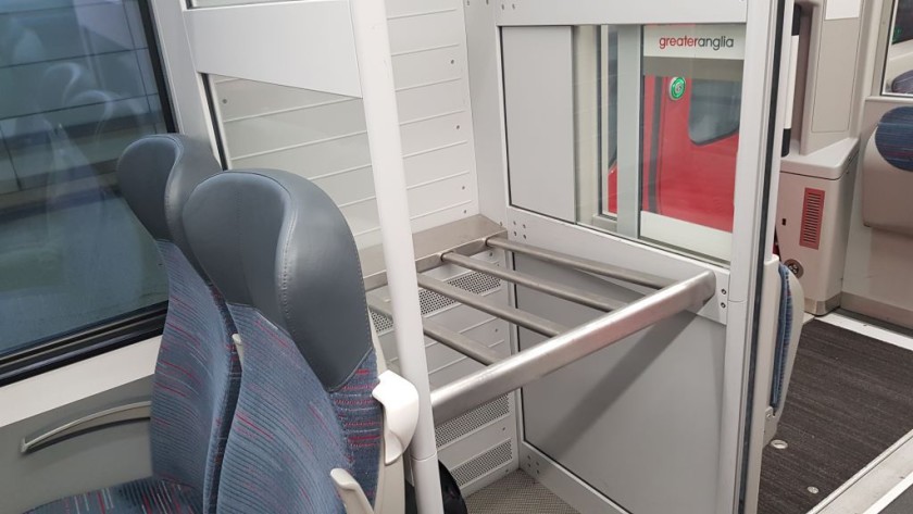Luggage racks are located by the doors