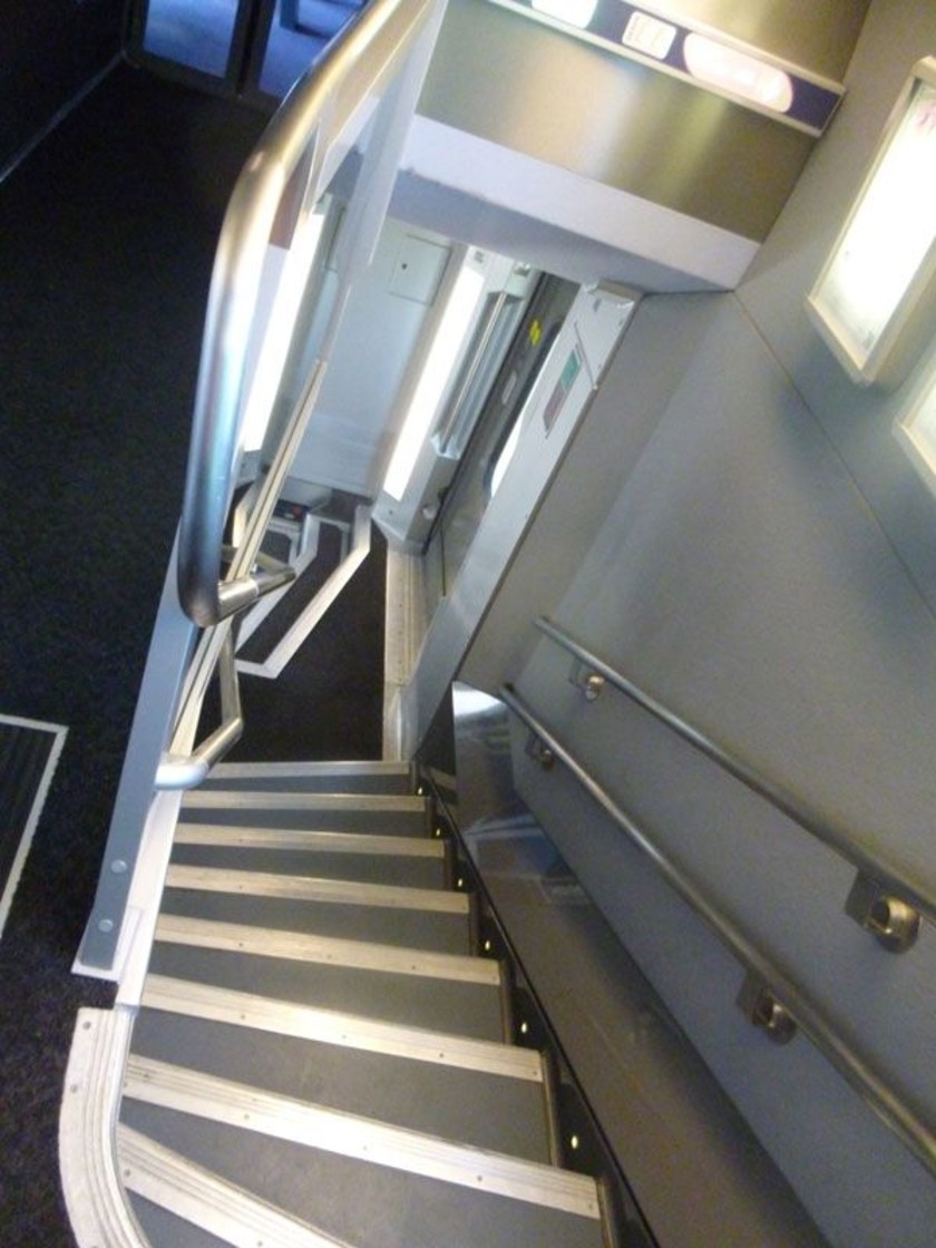 Looking down the staircase from the upper deck