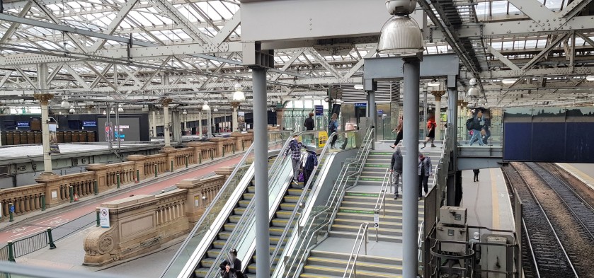 These stairs and escalators go up to the interim mezzanine level