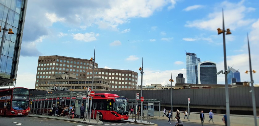 The bus stands outside the upper level concourse