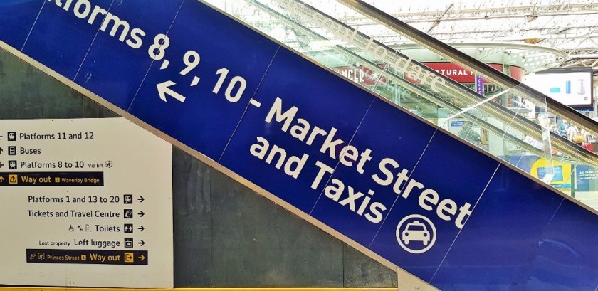 The escalators are clearly labelled with specific exits, but they all link the concourse to the same footbridge