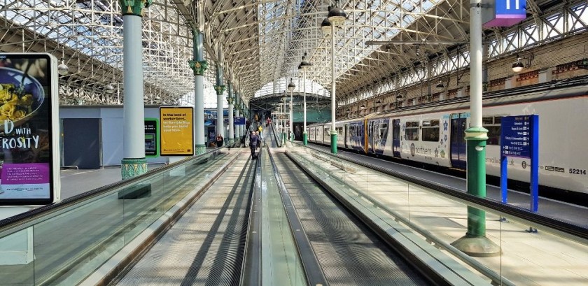 The moving walkways that connect the main concourse to the platform 13-14 lounge