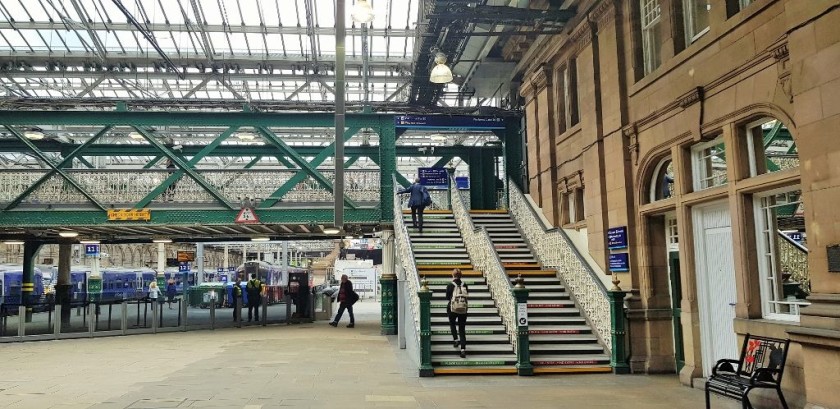 You don't have to use this staircase, the escalators which lead to the exits are behind it and over to the right