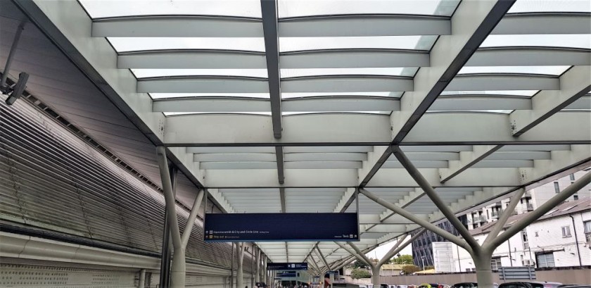 Follow this covered walkway to the part of the Underground station used by trains to and from Hammersmith