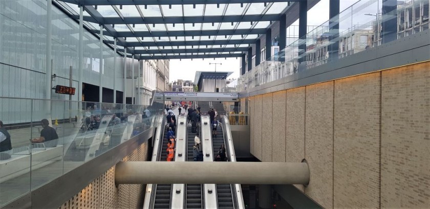 Having taken these elevators up from the Elizabeth line, the main concourse is through the gaps in the wall on the left