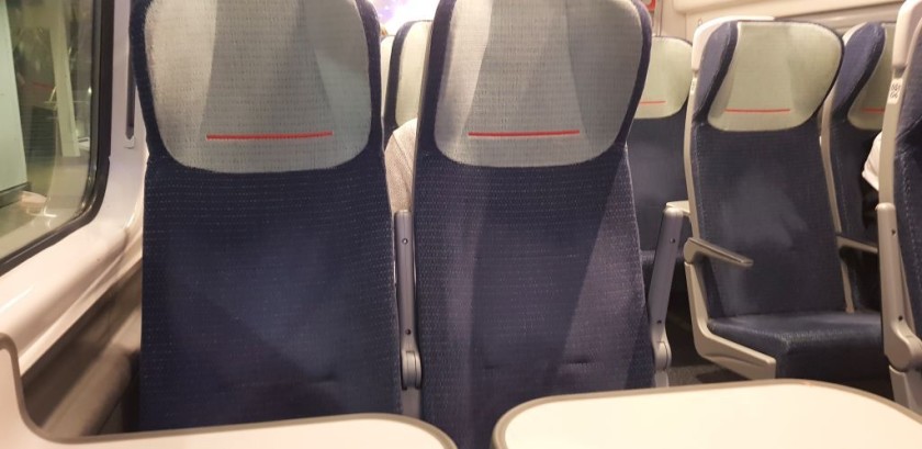 A few of the Standard Class seats have tables