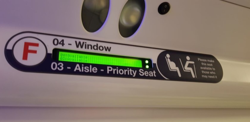 When a seat(s) is available the text has a a green background and green lights are shown