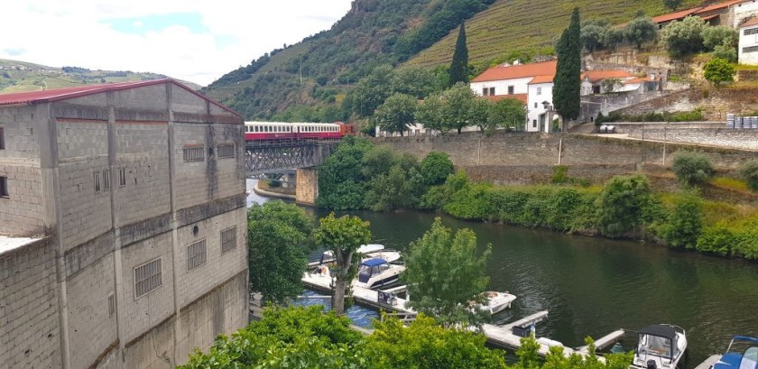 A train departs from Pinhao on the Douro Valley line