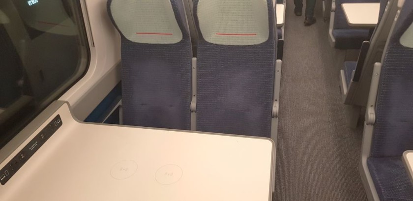 The larger fixed tables have built in Wireless chargers