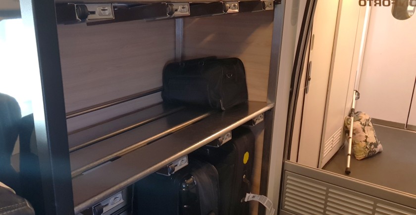 A luggage rack on an AP train