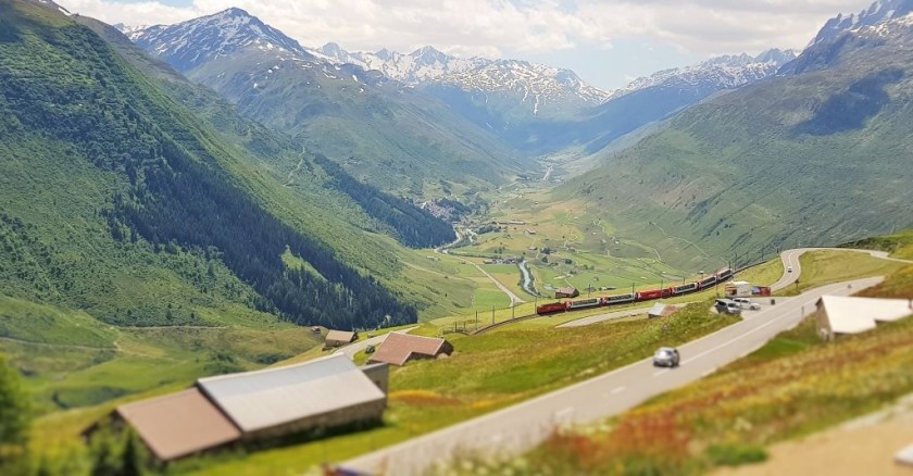 The Glacier Express winds down to Andermatt during its epic journey
