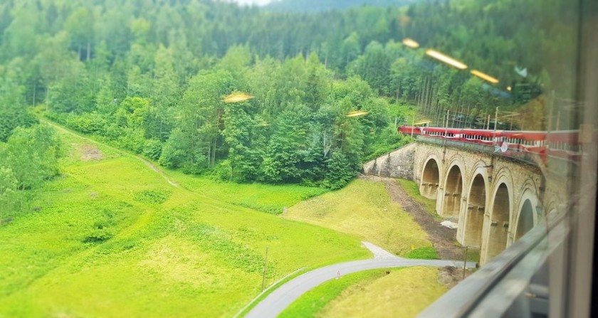 Crossing one of the many viaducts on the Semmeringbahn (the train is not in the usual Railjet livery)