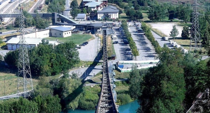 The bridge at top left in the image connects the trains to the funicular