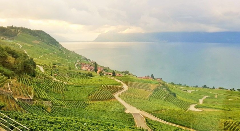 Lake Geneva can be seen on the left hand side of the train