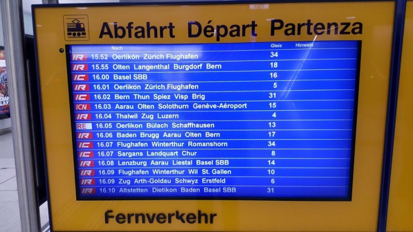 Long distance 'Fernverkehr' departure screen on the shopping concourse