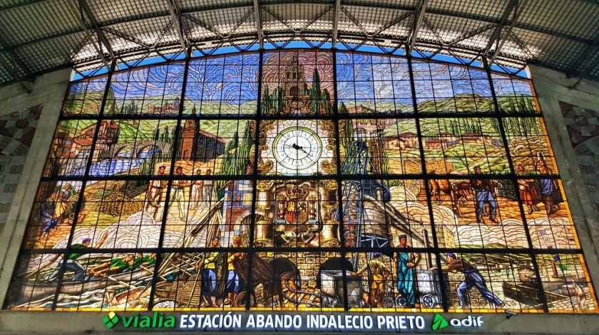 The stunning wall of stained glass at the rear of the concourse at Bilabao-Abando station